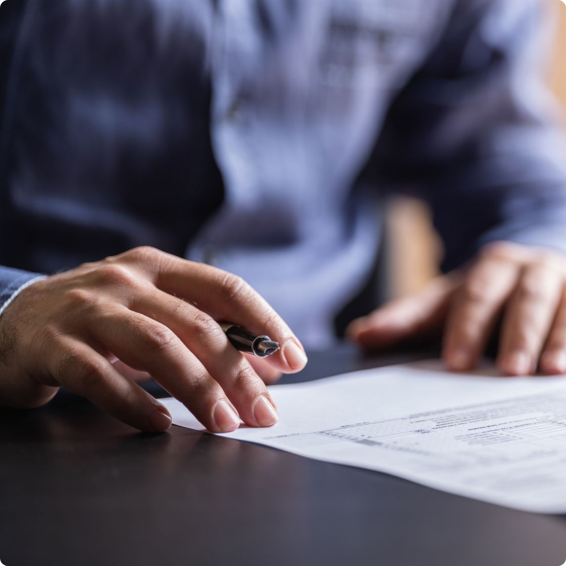 A person signing a document