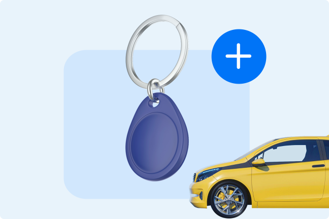 RFID atslēga un dzeltenais elektroauto.